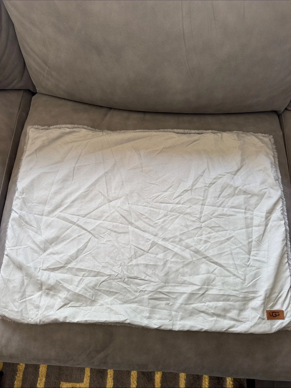 UGG gray faux fur pillow cover. Hidden zipper edge. Approximately 26 x 19.5 inch